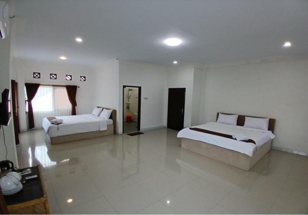 Hotel Pondok Putri Batukaras Rom bilde